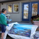 Jane painting a big En Plein Air canvas on Galiano Island.
